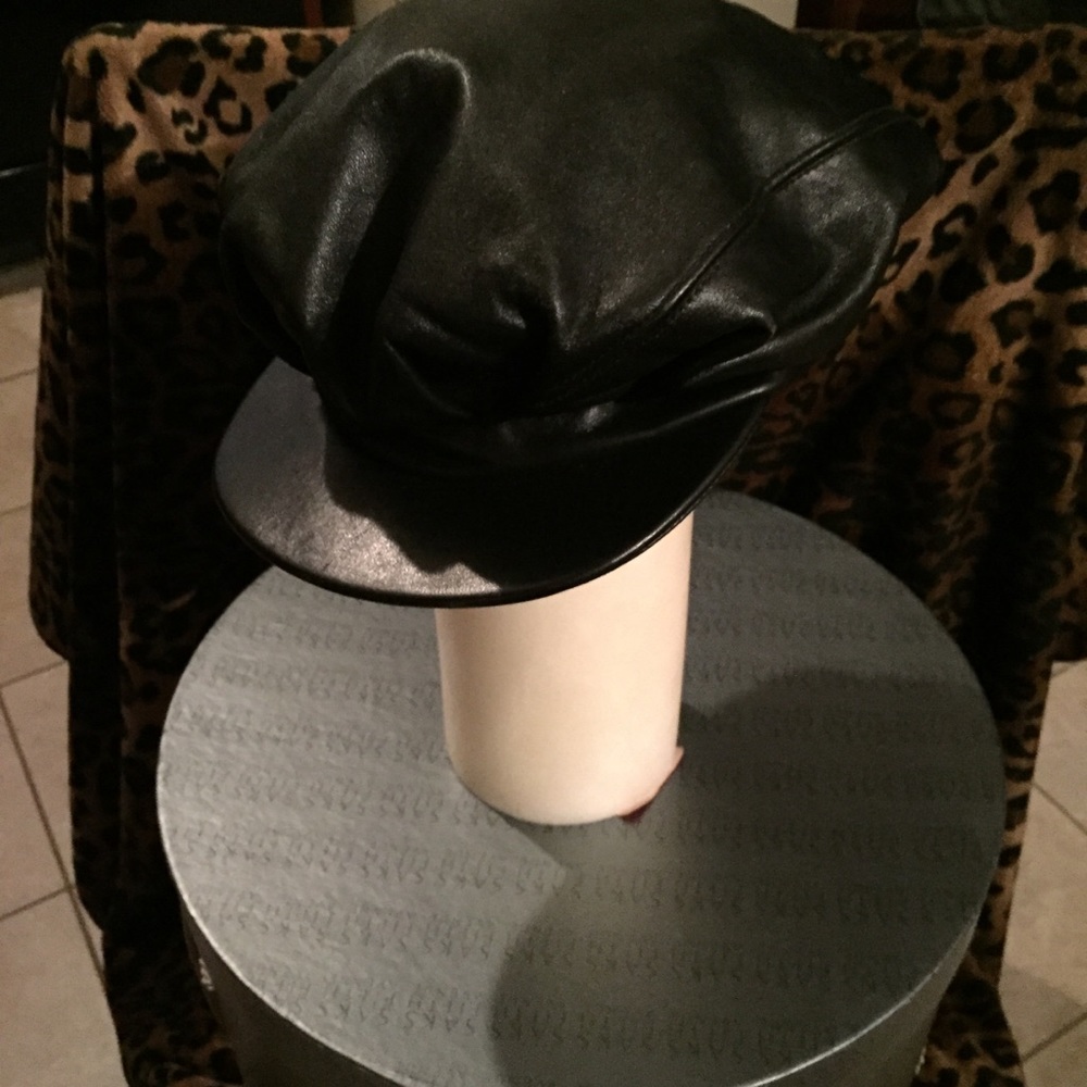 Black leather motorcycle  cap by Kokin.